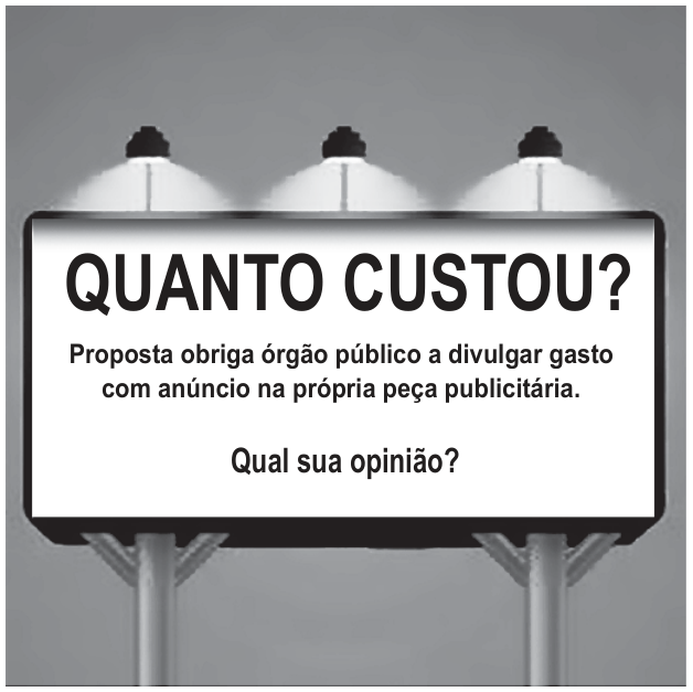 Outdoor iluminado por três refletores. Texto: “QUANTO CUSTOU? Proposta obriga órgão público a divulgar gasto com anúncio na própria peça publicitária. Qual sua opinião?”